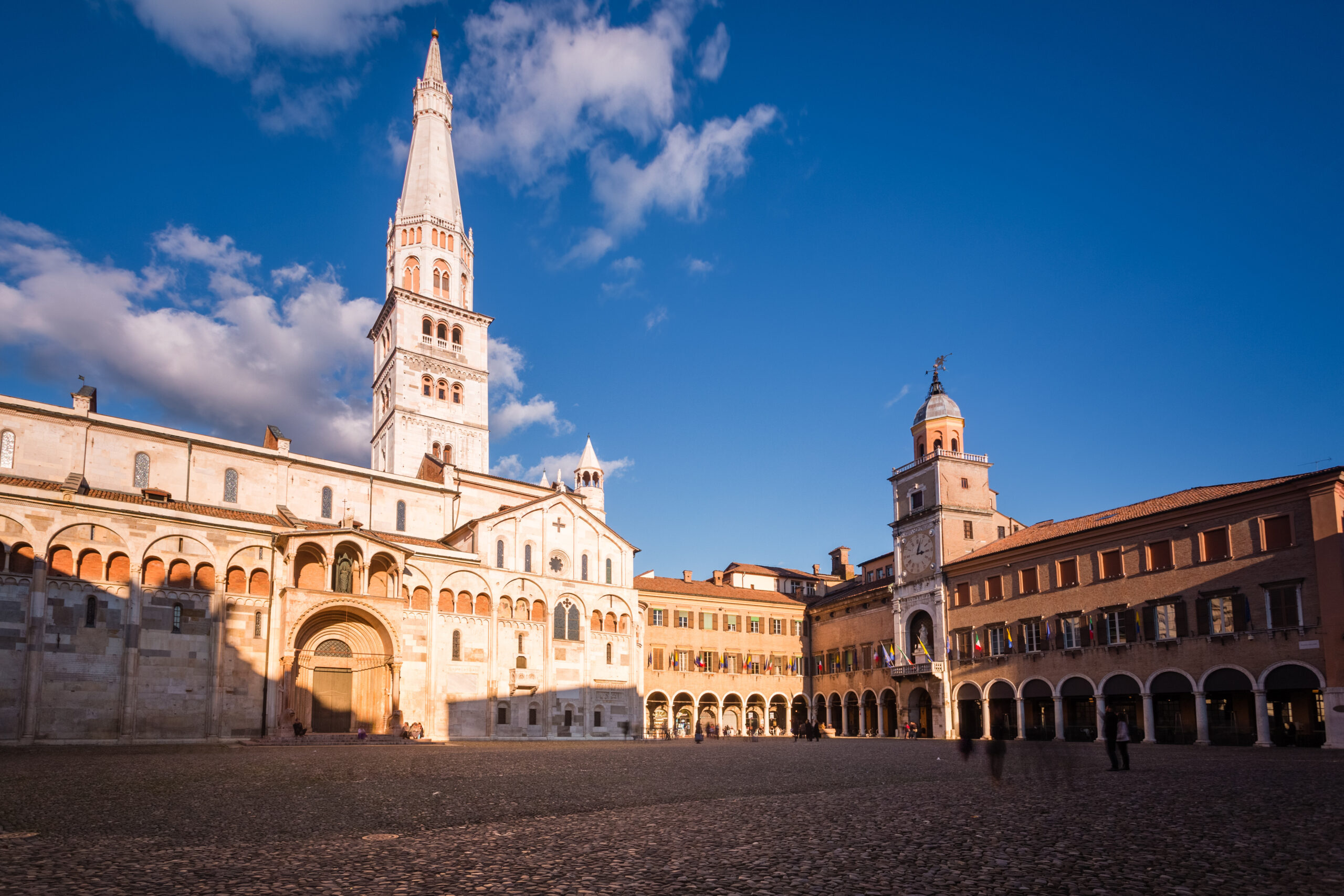 Modena, Emilia Romagna, Italy. Piazza Grande and Duomo Cathedral at sunset.